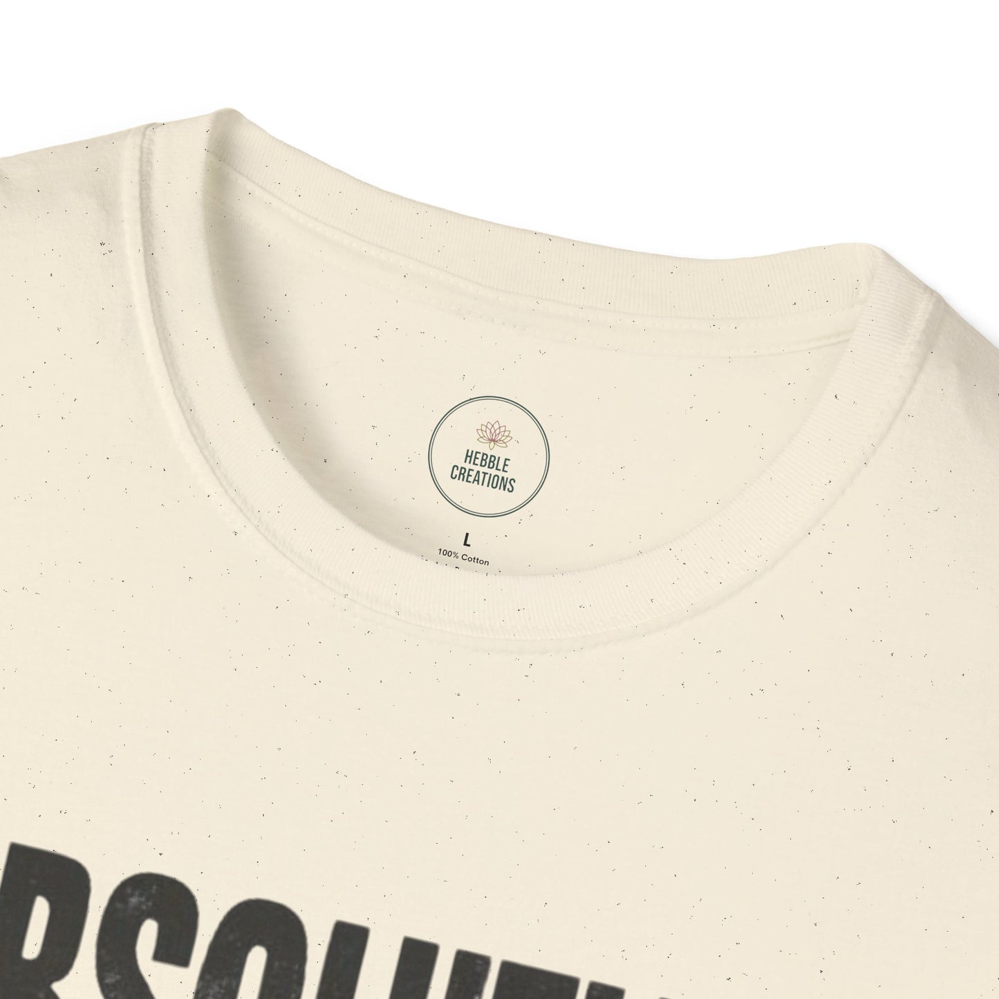 Close-up of a beige t-shirt with a logo on the collar and text at the bottom.