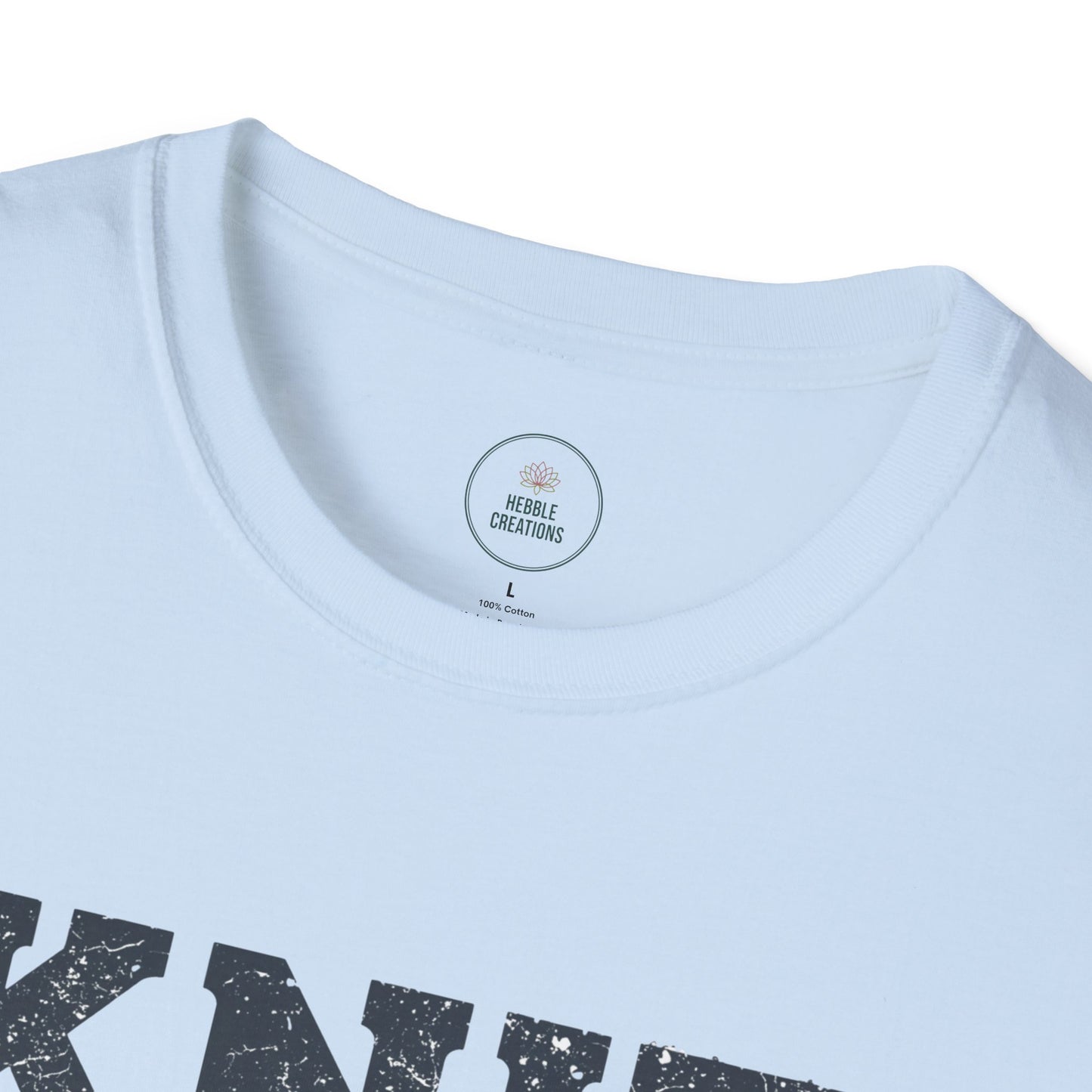 Light blue t-shirt with black text and a visible brand label on a white background