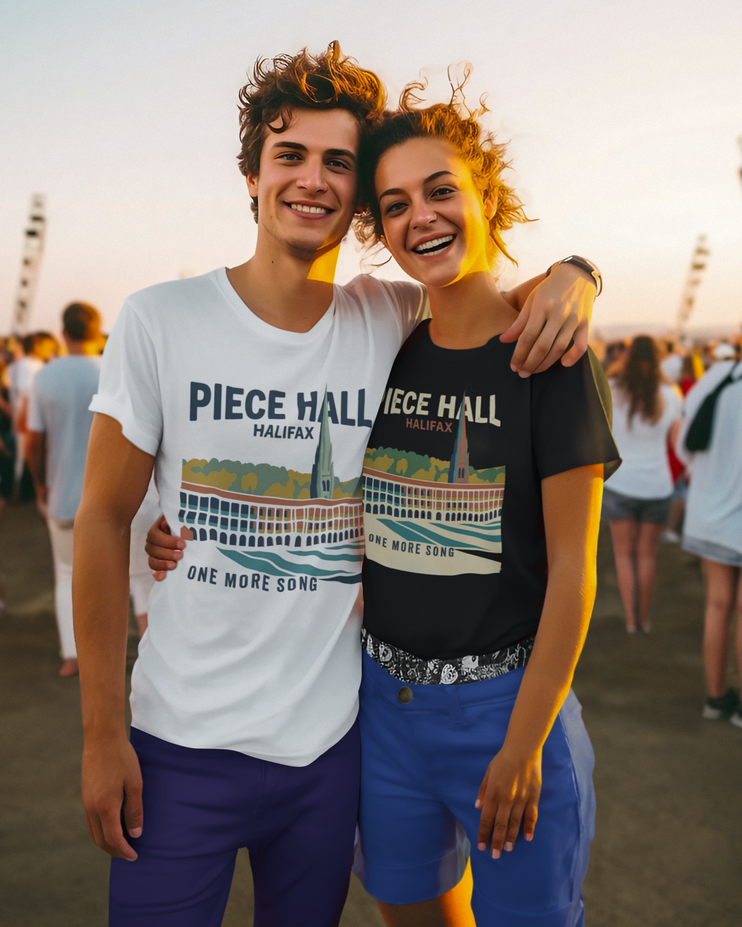 Two people wearing Piece Hall Halifax t-shirts at an outdoor event.