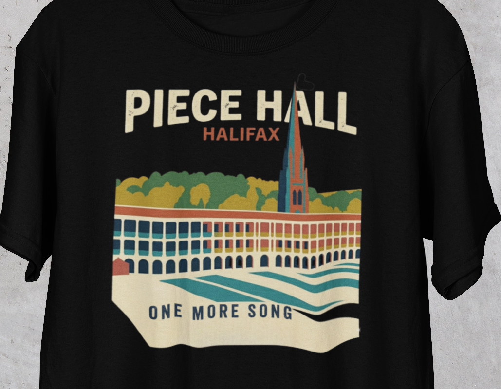 Black t-shirt with 'Piece Hall Halifax' graphic design on a gray background